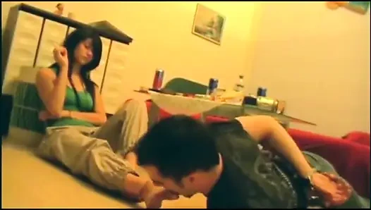 Licking her young feet