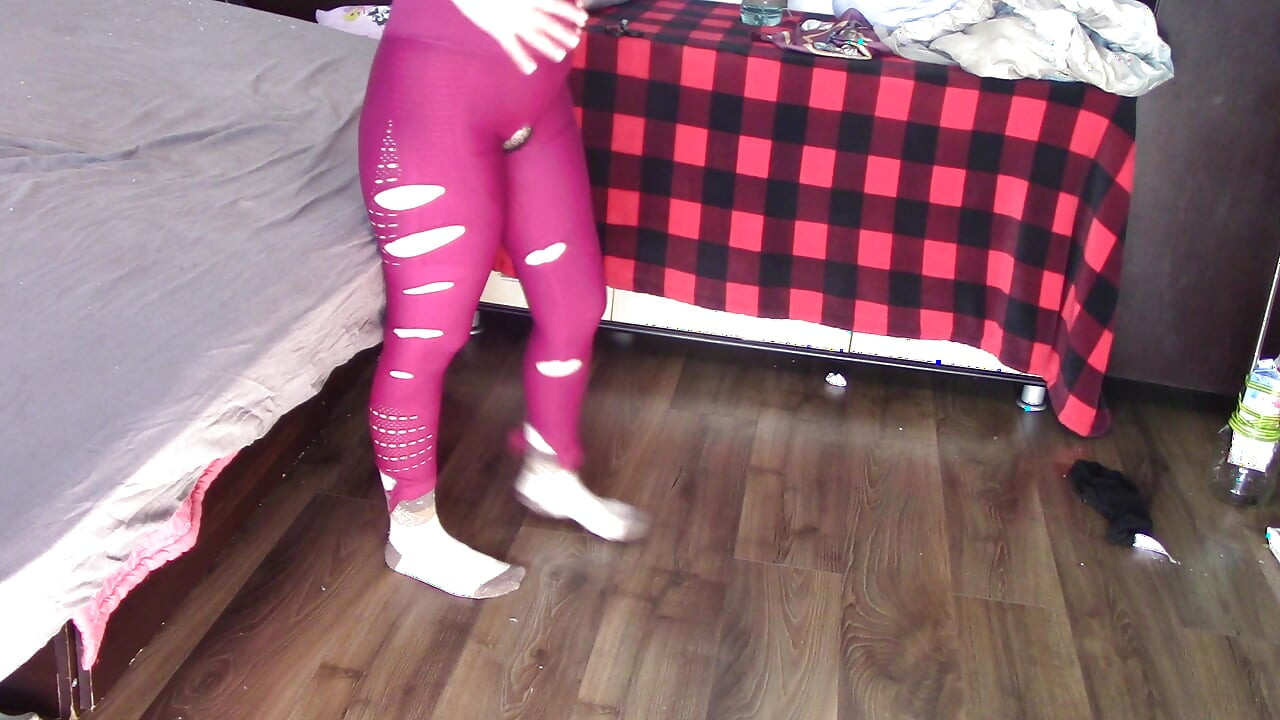 Amateur wife dancing and trying on clothes she cuts. Amateur wife vacuuming in bedroom.