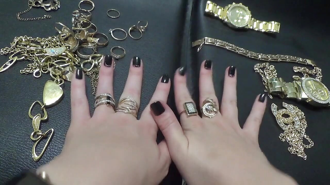 Golden jewelry and hand fetish