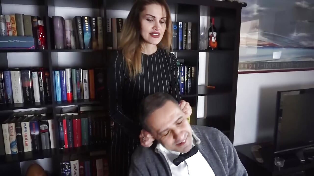 Femdom chick punishes her male slave in the office