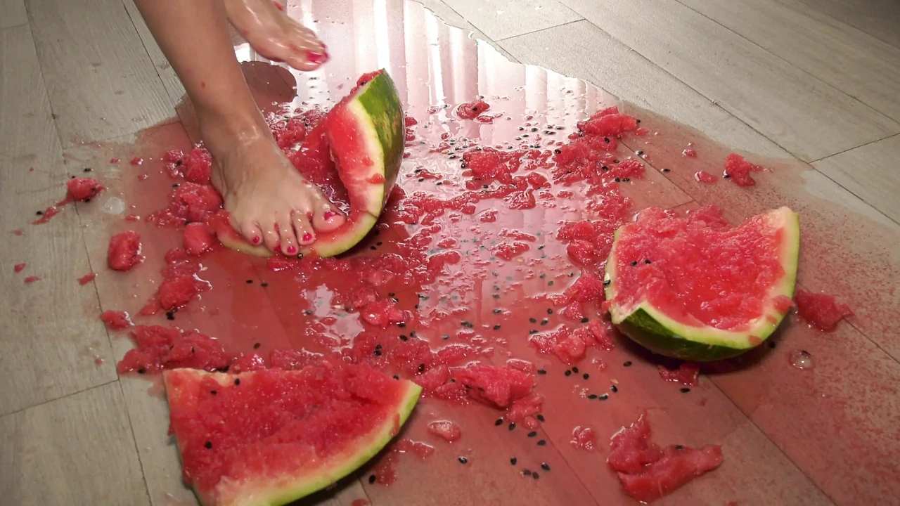 Busty MILF Presents Her Feet and Plays with a Watermelon