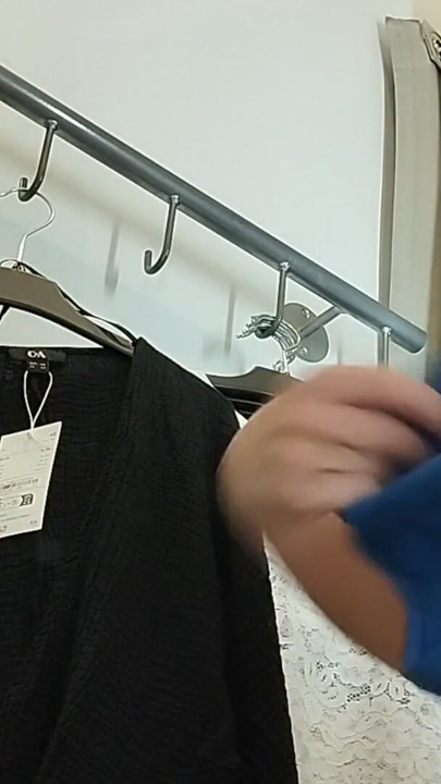 Sexy woman trying on clothes naked in the fitting room. | Clip 1