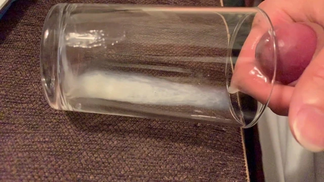 Slow motion Cumshot to glass cup