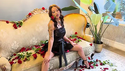 Beautiful Monika Fox In Black Dress On Sofa With Roses
