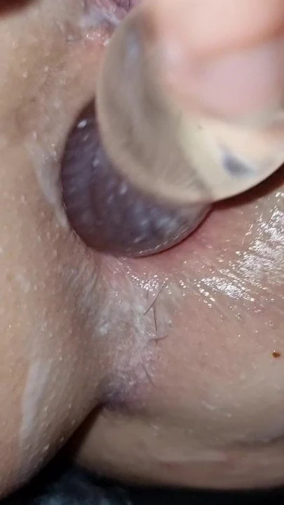 Close-up of creamy pussy and anal with glass dildo