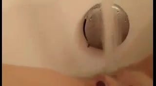 Shaved MILF water fun!