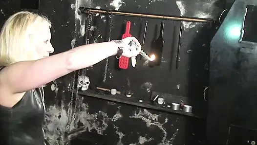 Whipping and wax play for the tape bondaged mature blonde