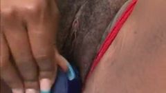 Ebony - Red suit, blue nails, hairy pussy