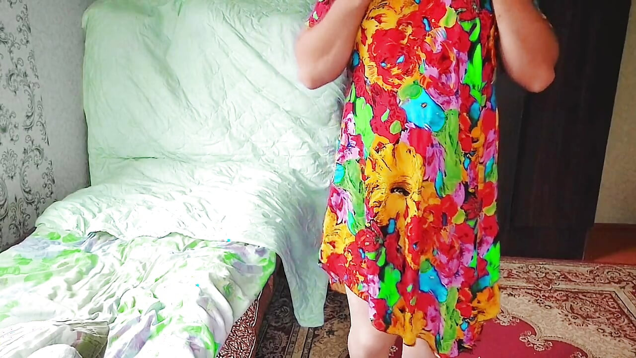 Stunning trans beauty enjoying warm sunlight by balcony