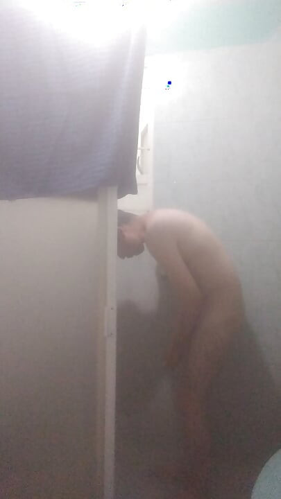 Naked man in shower