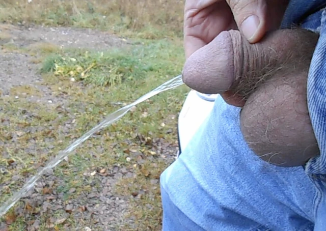 Me pissing in public outdoors in woods