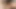 Gorgeous blonde in glasses plays with a dildo at work