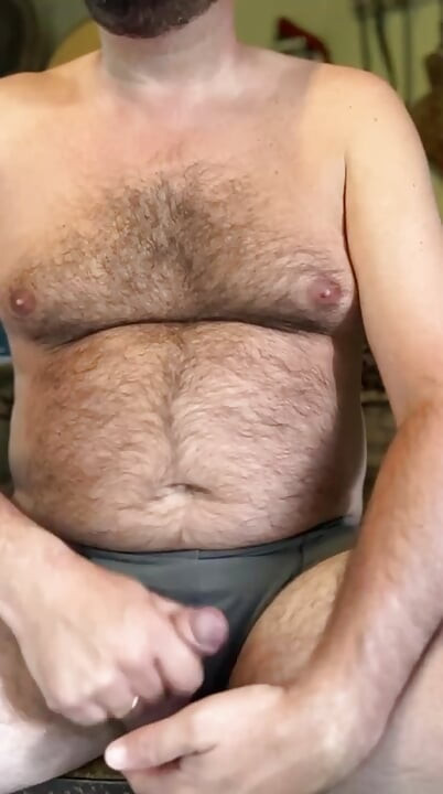 Hairy and gut-strapped cowboy trucker jerks off his small cock