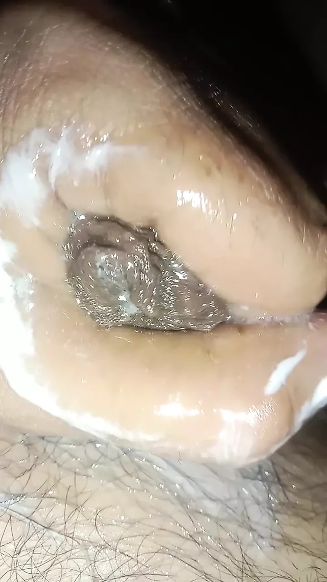 A Close-up on My Cock's Oiled Head
