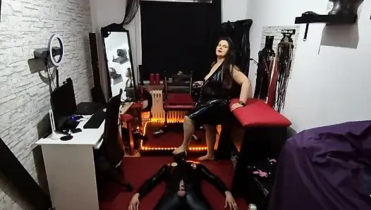 Latex Domme MILF Tramples Slave Dripping in Sweat