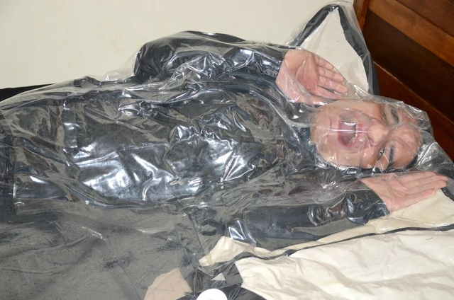 Mar 26 2023 - VacPacked in Mikes winter coat with my PVC aprons