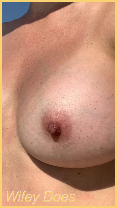 Wife walks around public beach fully nude