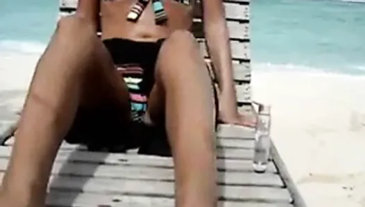 Sexy wife masturbating at the beach