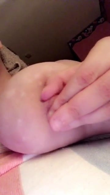 Playing with her tit