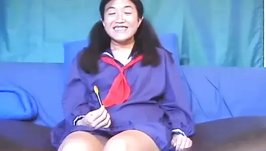 Asian petit on the cock in a college uniform