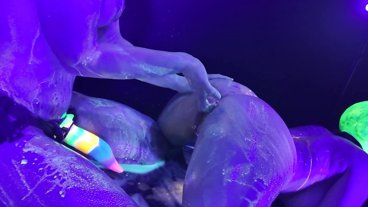 Neon Rave Girl on Girl Dildo Play