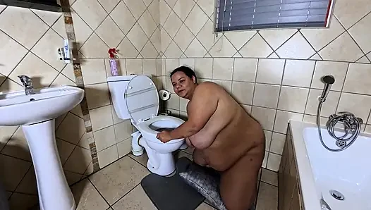 Playing with my fat pussy while licking the toilet