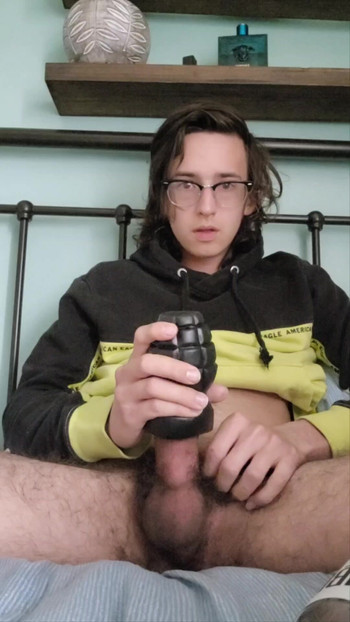 Rubbing big cock with toy