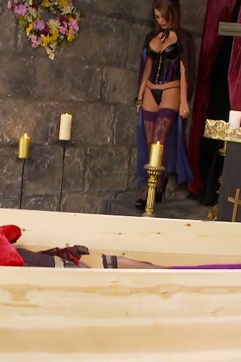 Hot vampire babes love licking each other's dripping fuck hole in a coffin