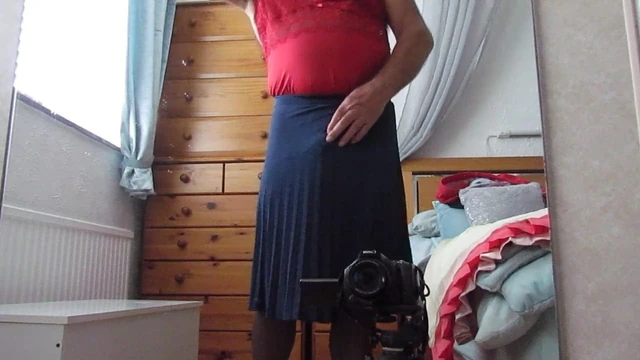 Wanking in pleated skirt and nylon slip