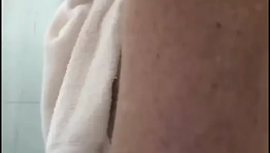 My stepmom taking a shower after fucking, to get the cum out of her.