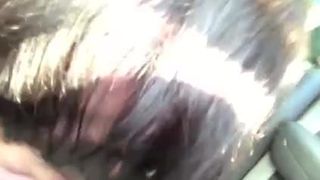 She records herlself working guy's cock while he drives