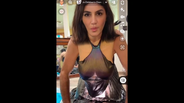 Drak-haired tranny wears transparent handkerchief top