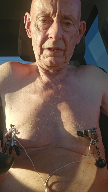 Captivating moment from "nipple torture with spiked clamps and tens unit"