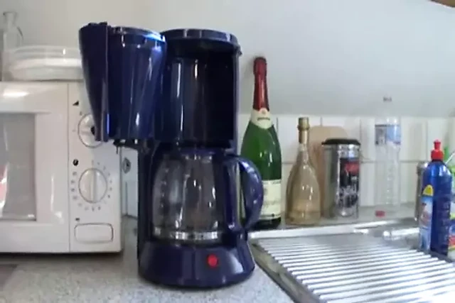 Granny gets fucked in the kitchen