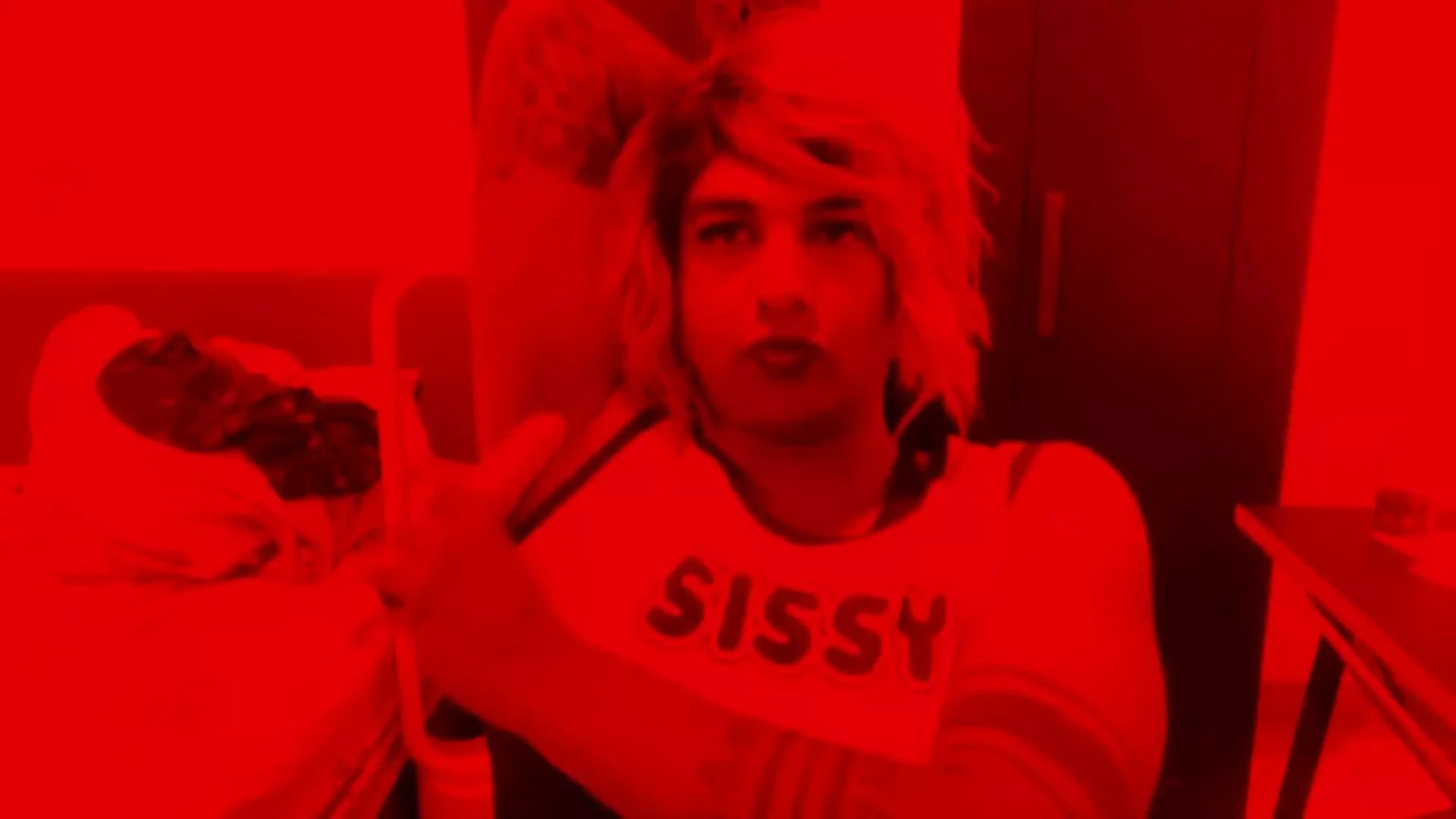 Travestito con il suo vestito da sissy