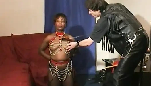 Tied up ebony French bitch enjoys BDSM action