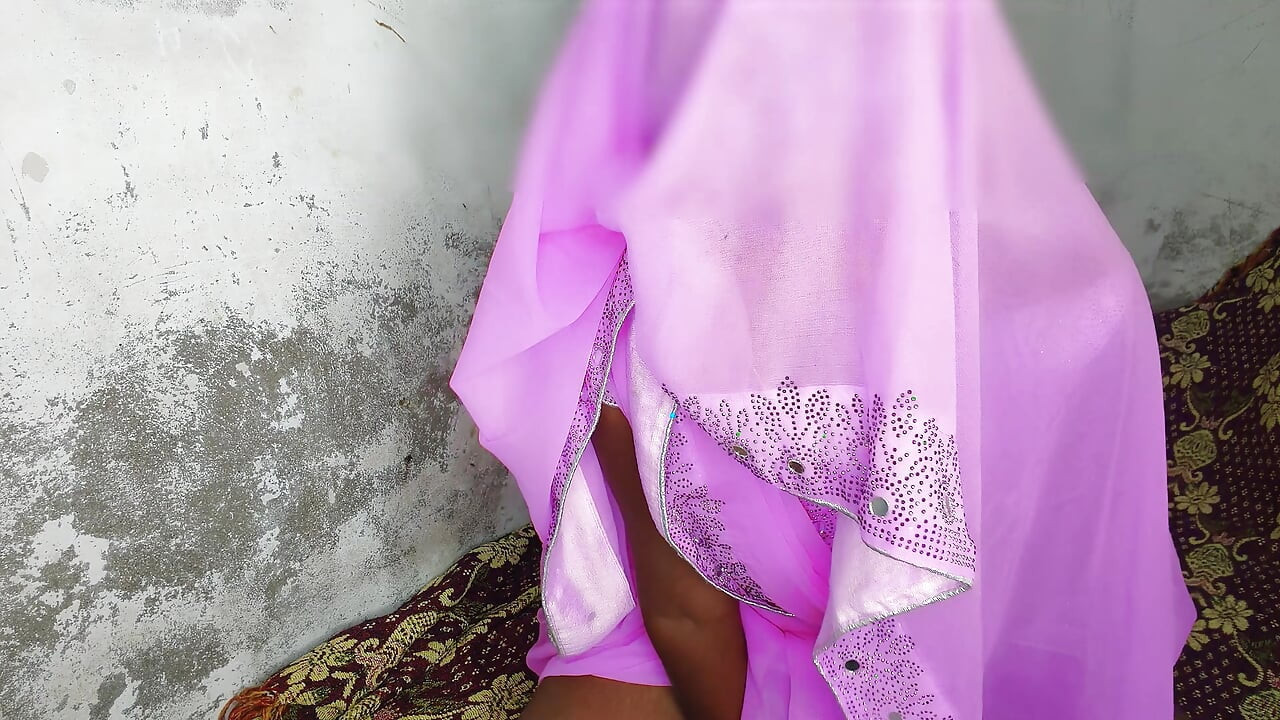 I am an Indian woman ready to have sex while wearing a pink Indian saree.
