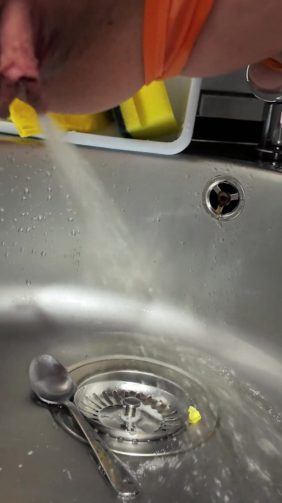 Latina Girl Desperate Had to Pee Into the Sink in Swimsuit