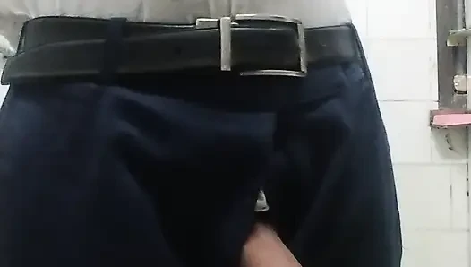 This video is of a village boy enjoying himself in the washroom with his hands.