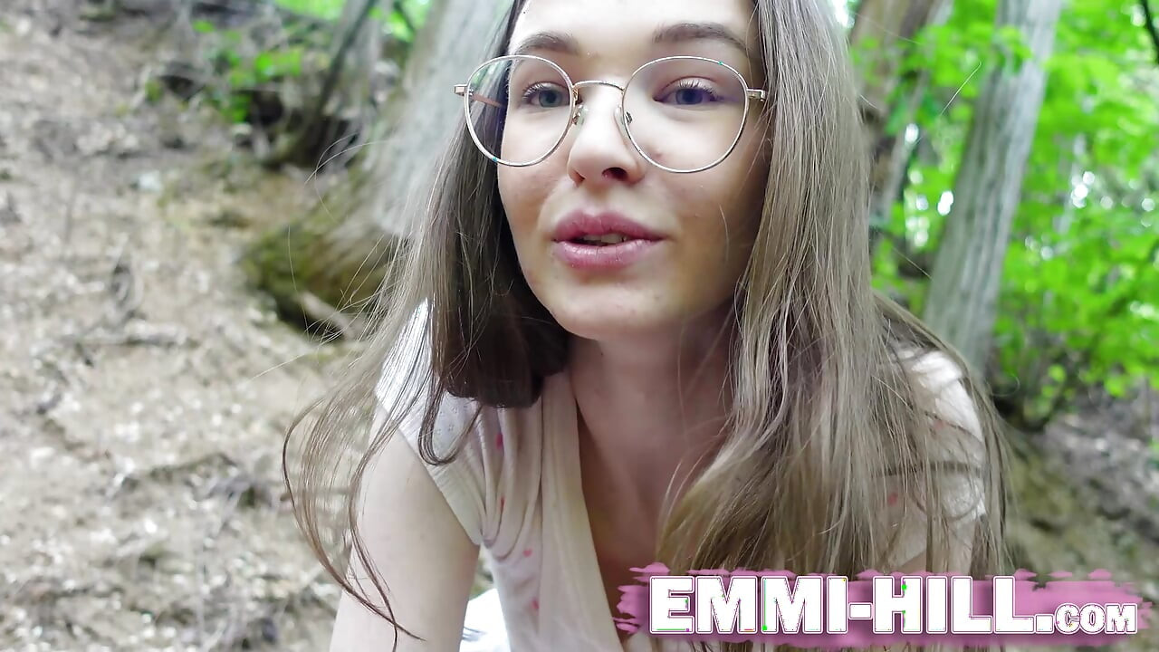 Wild fingering in the woods: Emmi plays with her long labia and jerks off her wet pussy hard