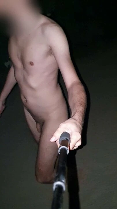 Walking the road at night naked and barefoot (1)