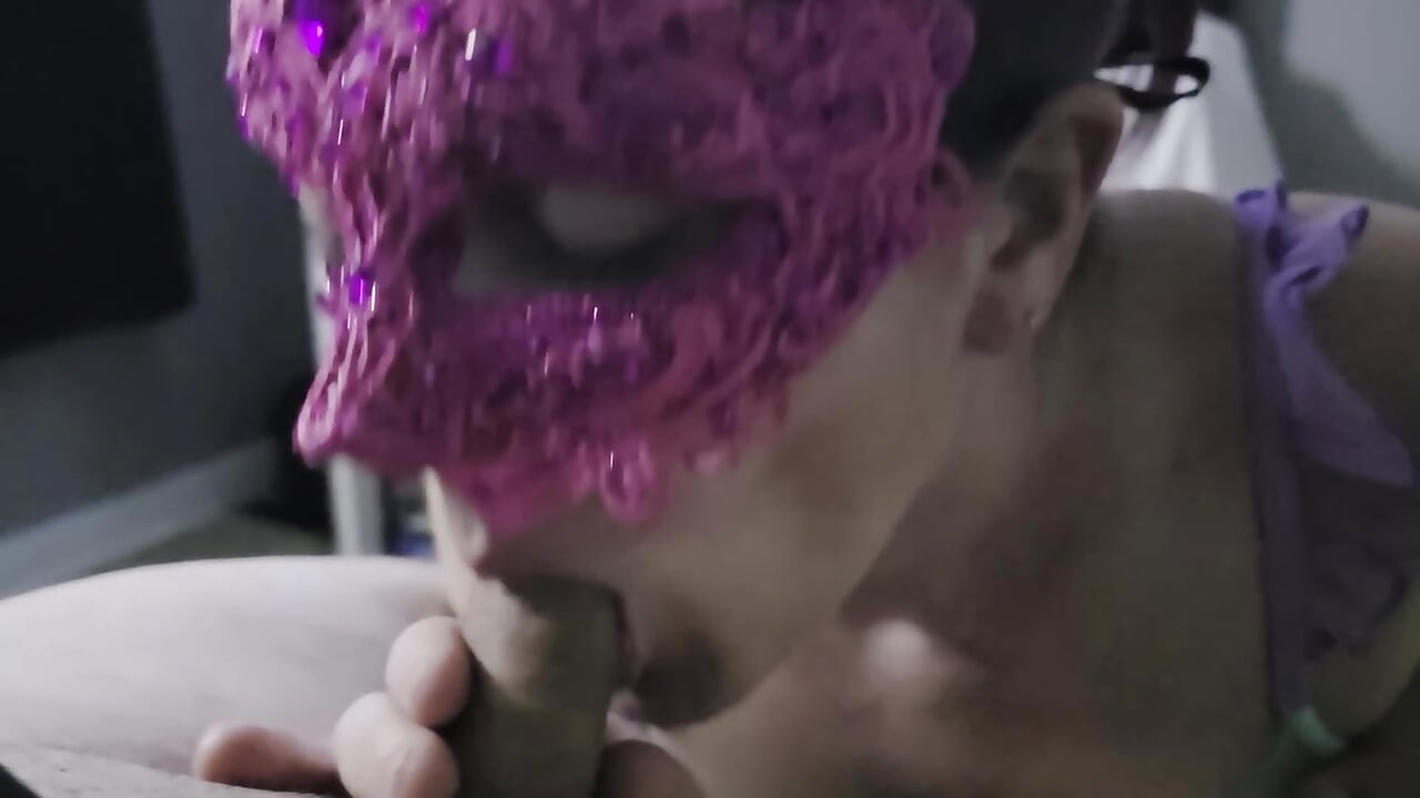 Slutty milf in a pink mask blowjob with swallow