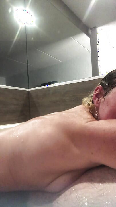 Flab fun in a jacuzzi! Slim n sexy Rachel Wriggler has slippy sliding soapy fun with a big chubby bear
