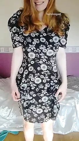 Redhead kindly shows under her summer dress