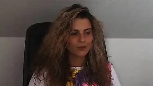Gorgeous curly haired babe masturbating in solo video