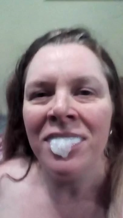 Black.cock fills my mouth with cum.  Big load