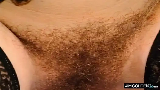 Rothaarige Verfuehrerin in leidenschaftlichem Ritt