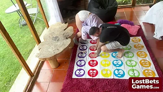 Amelia and Lucas are twisting up the heat with a strip Twister