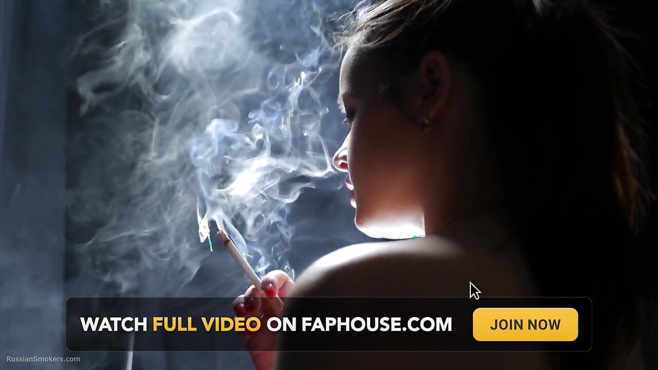 Topless Brunette Smoking in Dramatic Smoke