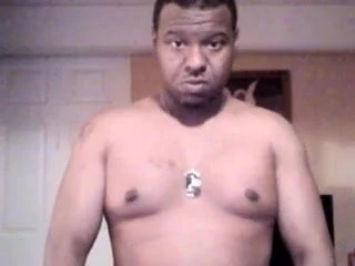 sexy black man puts on lotion